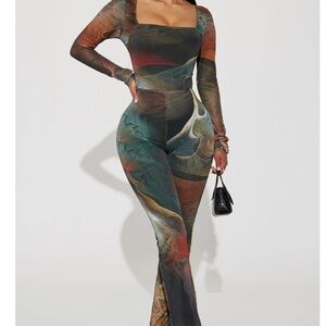 Lost in a Trance Mesh Jumpsuit by Fashion Nova